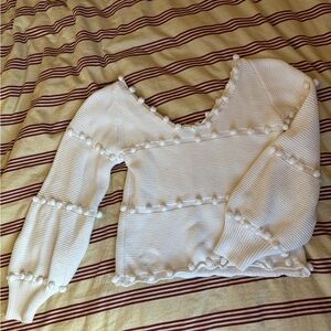 Storia Off-Shoulder White Pom-Pom Sweater